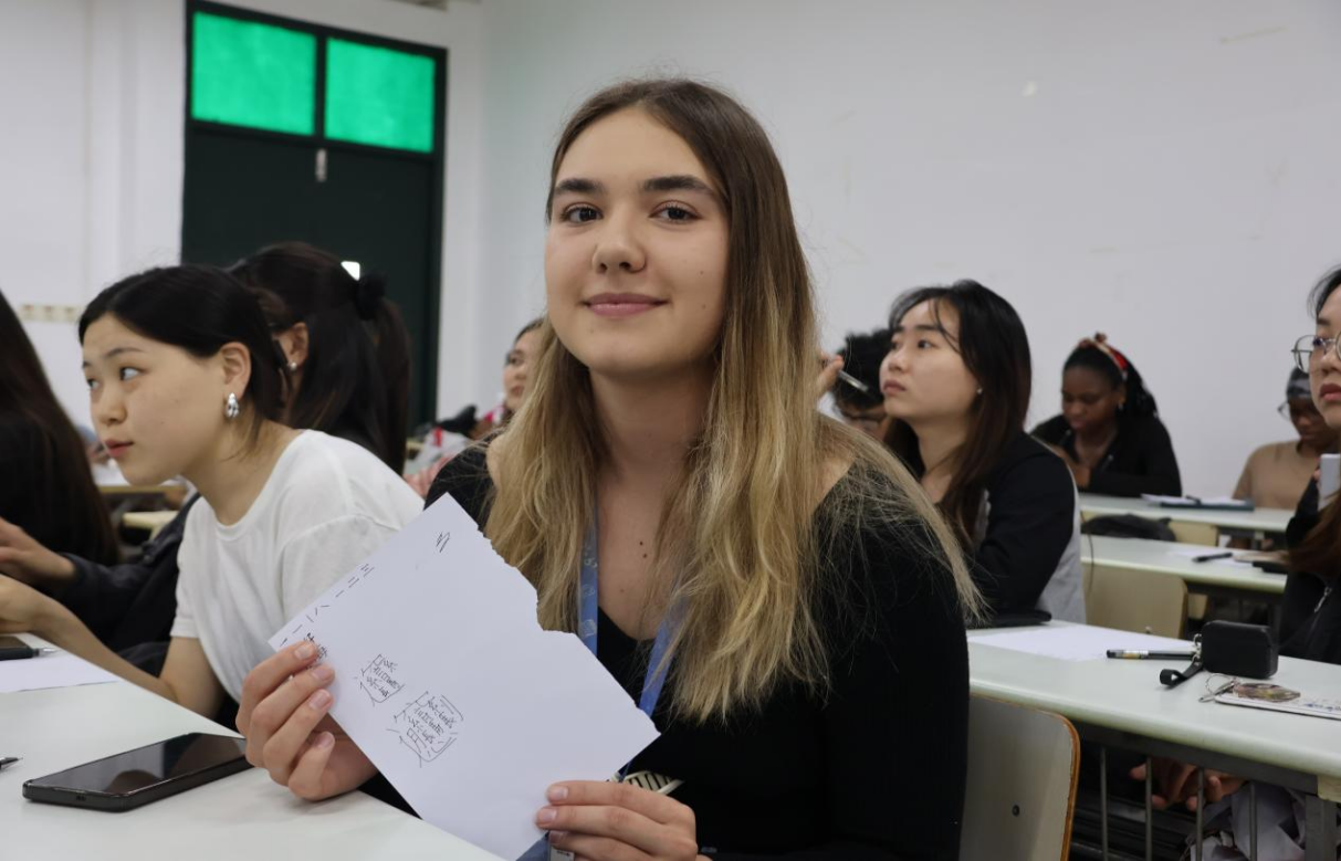 International Students Writing Chinese Characters 