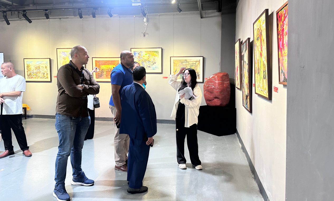 Staff Explaining Artworks to Participants