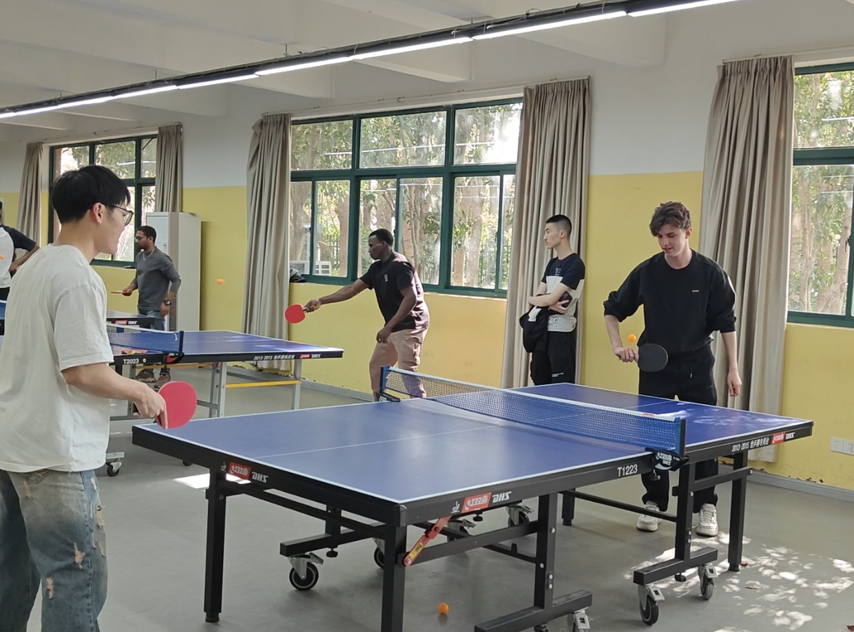 Photo: International students participating in the ping pong activity