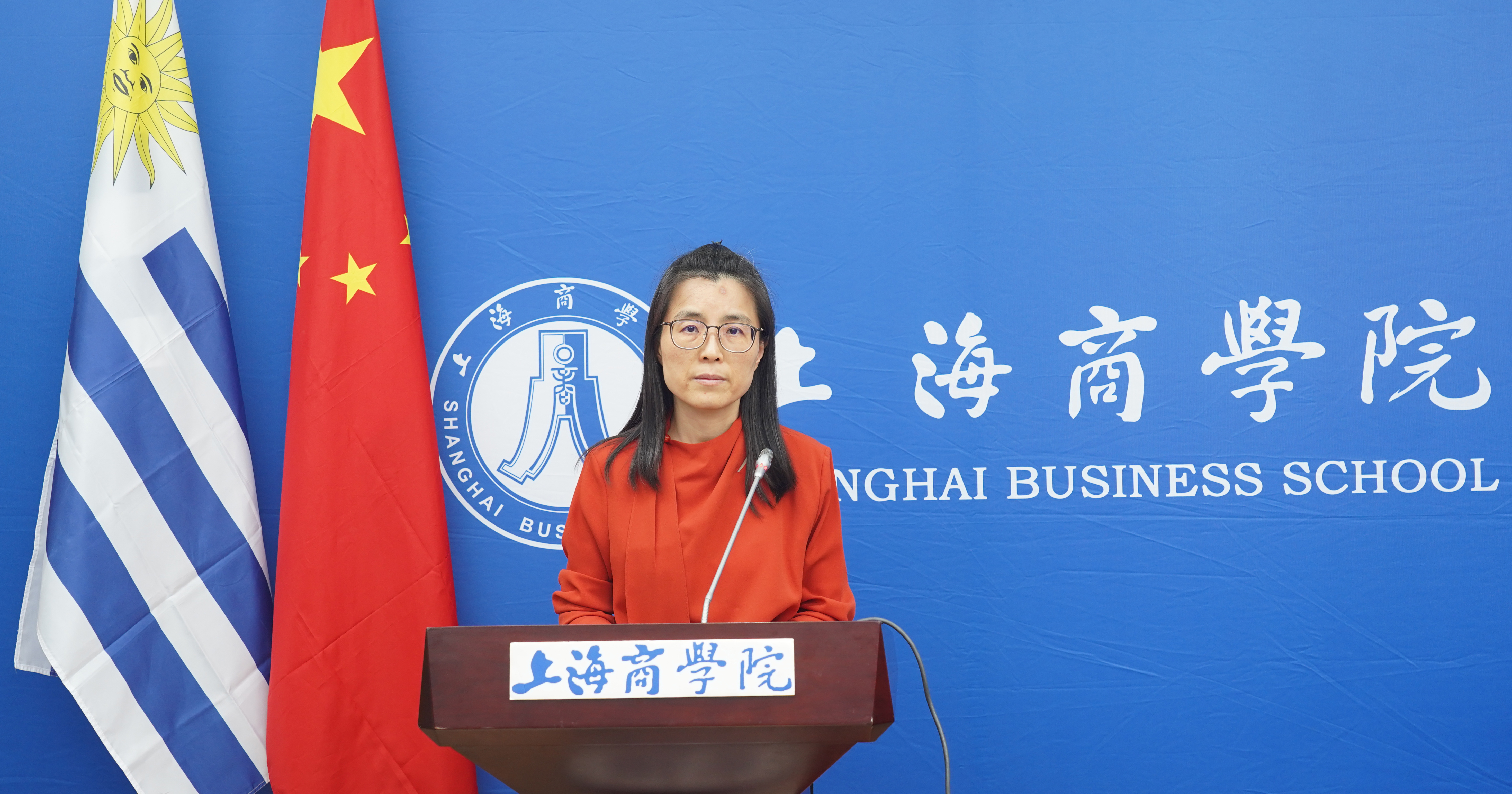 Photo: Dai Ying delivering her address