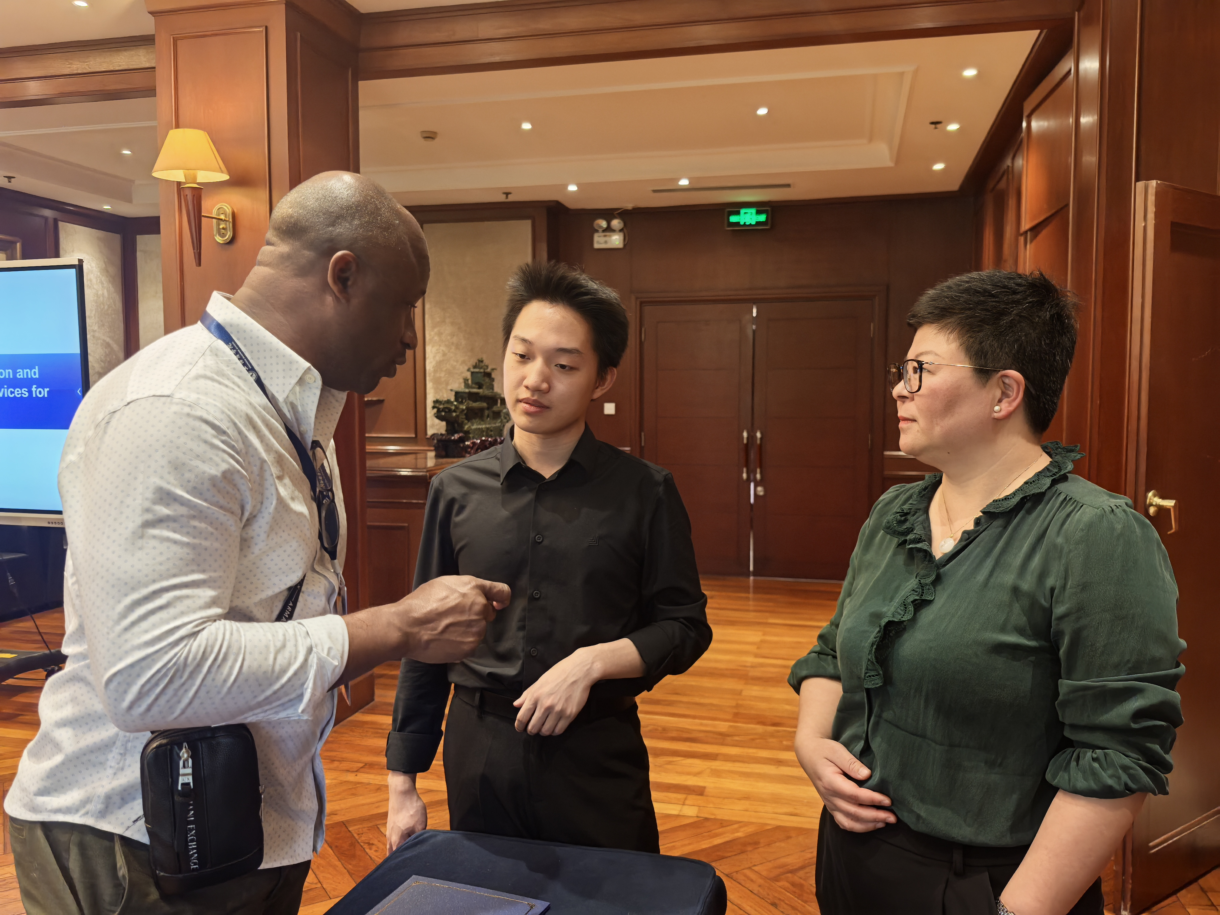 Photo: Anthony (first from the left) exchanging ideas with Chinese experts