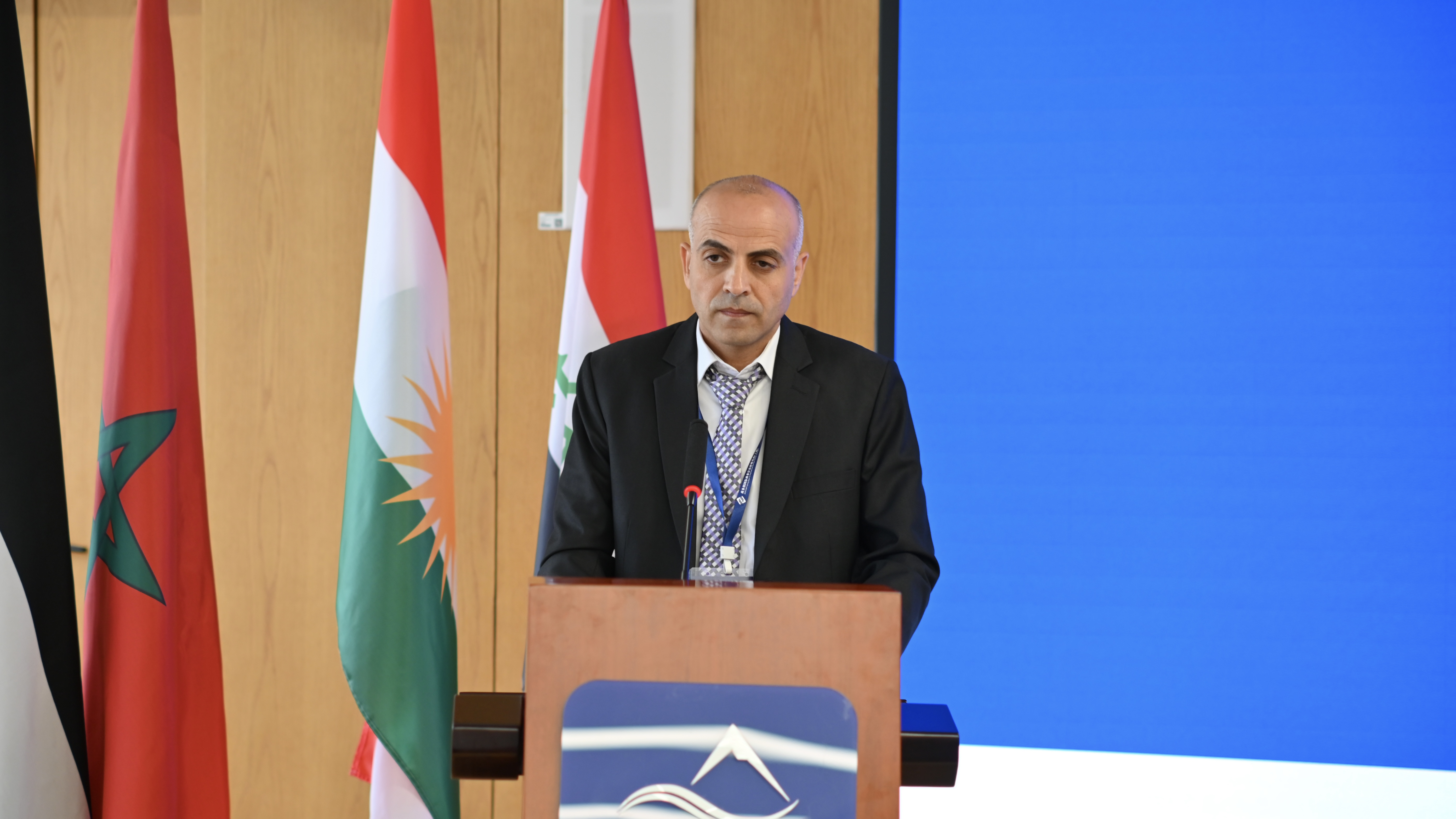 A participant representative delivering a speech